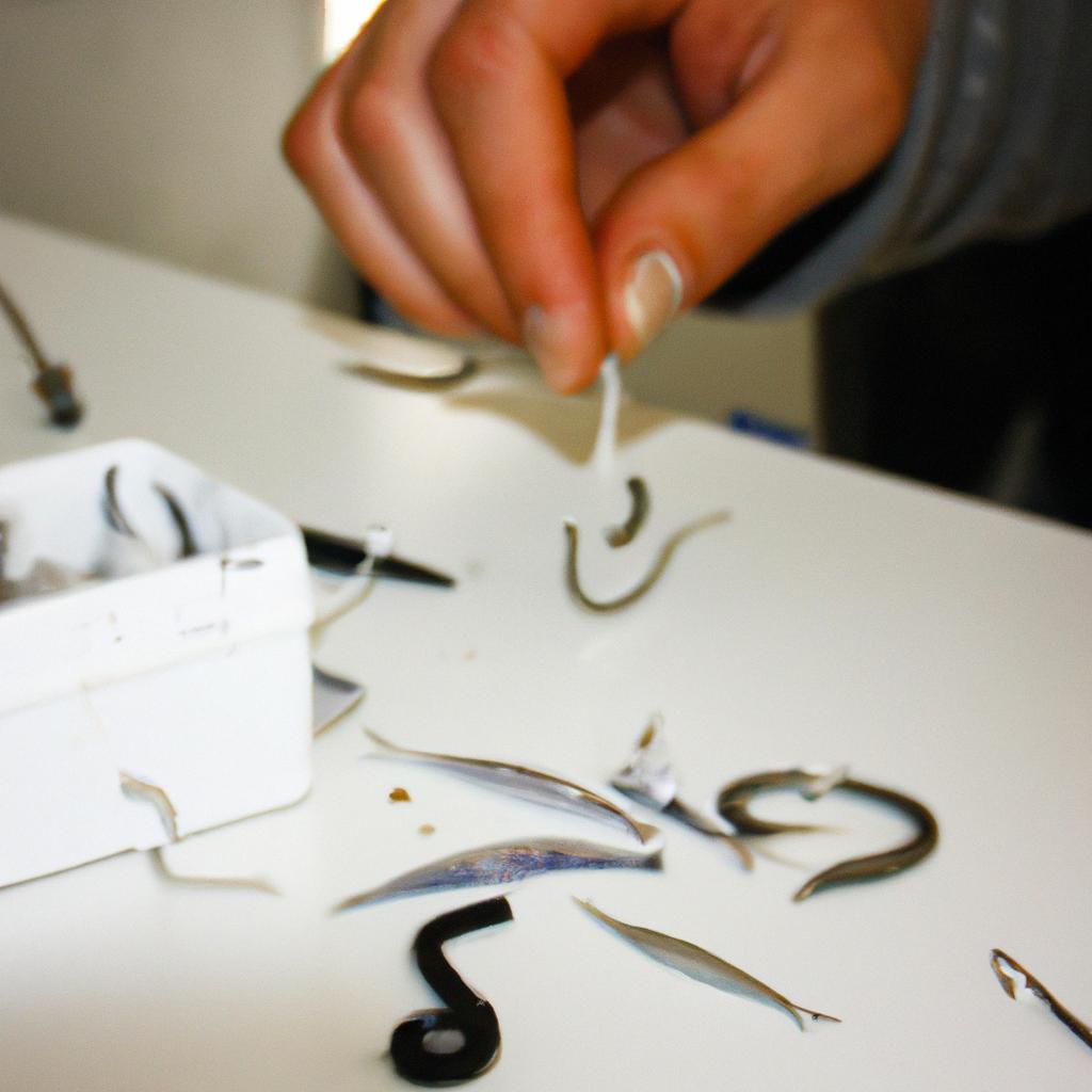 Person applying coating to fishing hooks